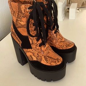 Akira orange and black platform boots